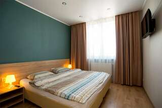 Фото Гостиница Sibgat Apartments Казань Апартаменты с гостиной и 2 спальнями. Вид на реку Казанку и аквапарк "Ривьера" 5 Гостиница Sibgat Apartments Казань Апартаменты с гостиной и 2 спальнями. Вид на реку Казанку и аквапарк "Ривьера"-5