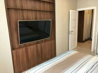 Фото Гостиница Sibgat Apartments Казань Апартаменты с гостиной и спальней с двуспальной кроватью 6 Гостиница Sibgat Apartments Казань Апартаменты с гостиной и спальней с двуспальной кроватью-6